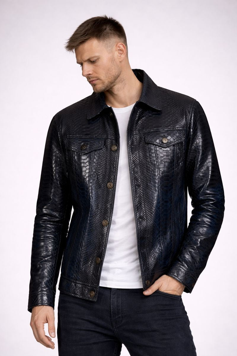 Man wearing a black leather jacket over a white shirt on a white background