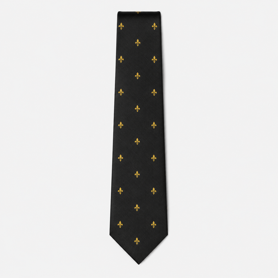 The Aosta Tie – black and gold fleur-de-lis silk tie on a light grey background