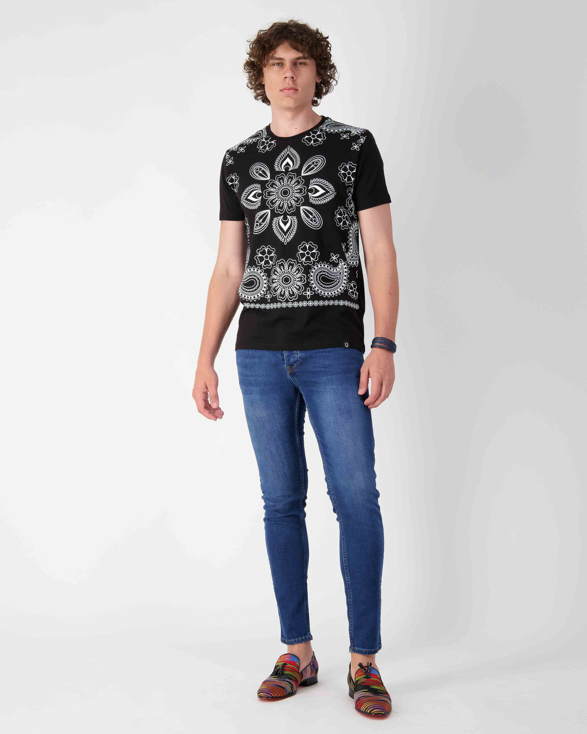 URBBANA black cotton T-shirt with paisley graphic.