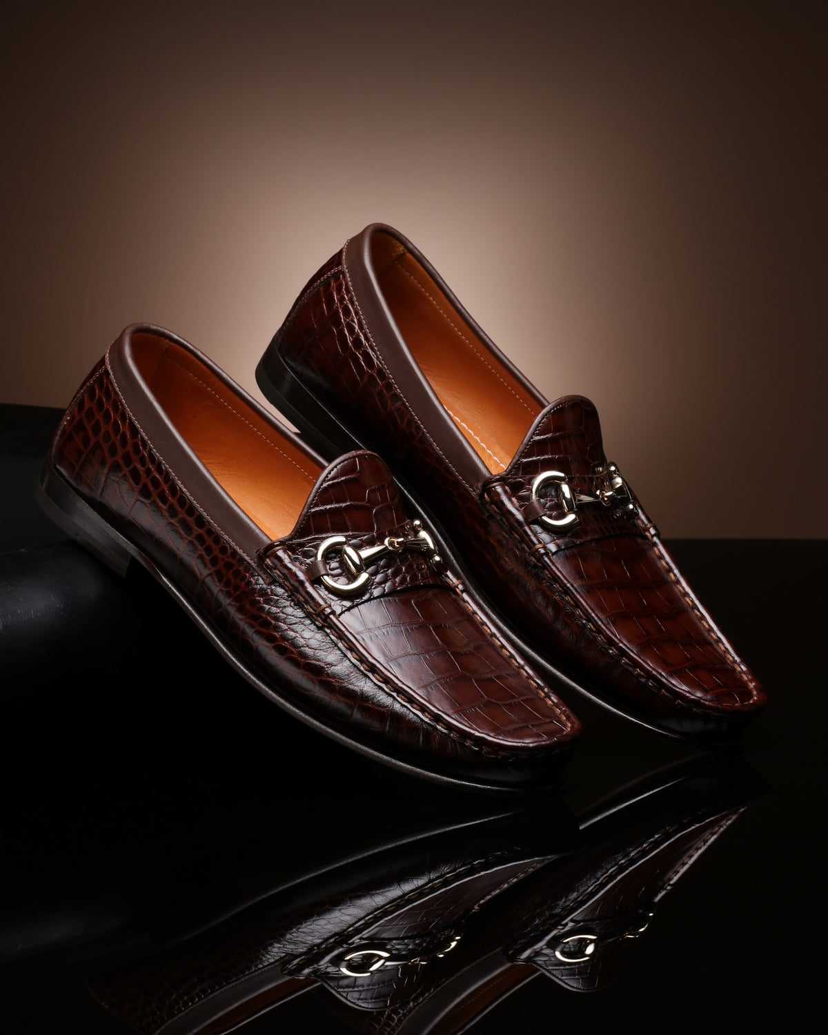 URBBANA brown croco-embossed horsebit moccasins.