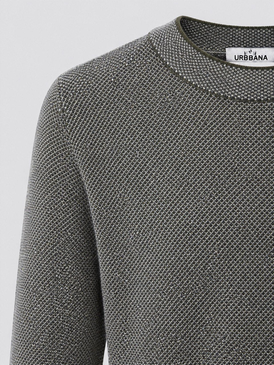 Close-up of a grey textured knitted crew-neck sweater.