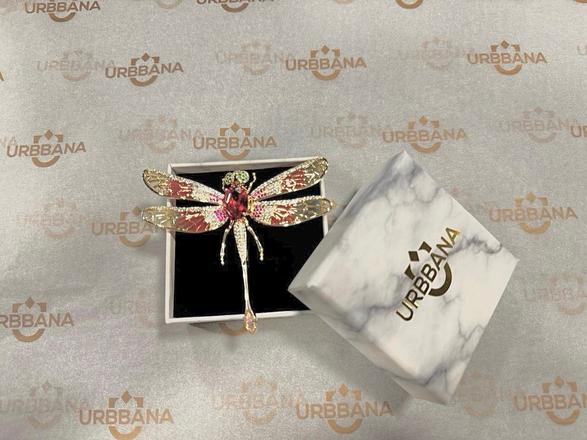 Embellished red dragonfly lapel pin.