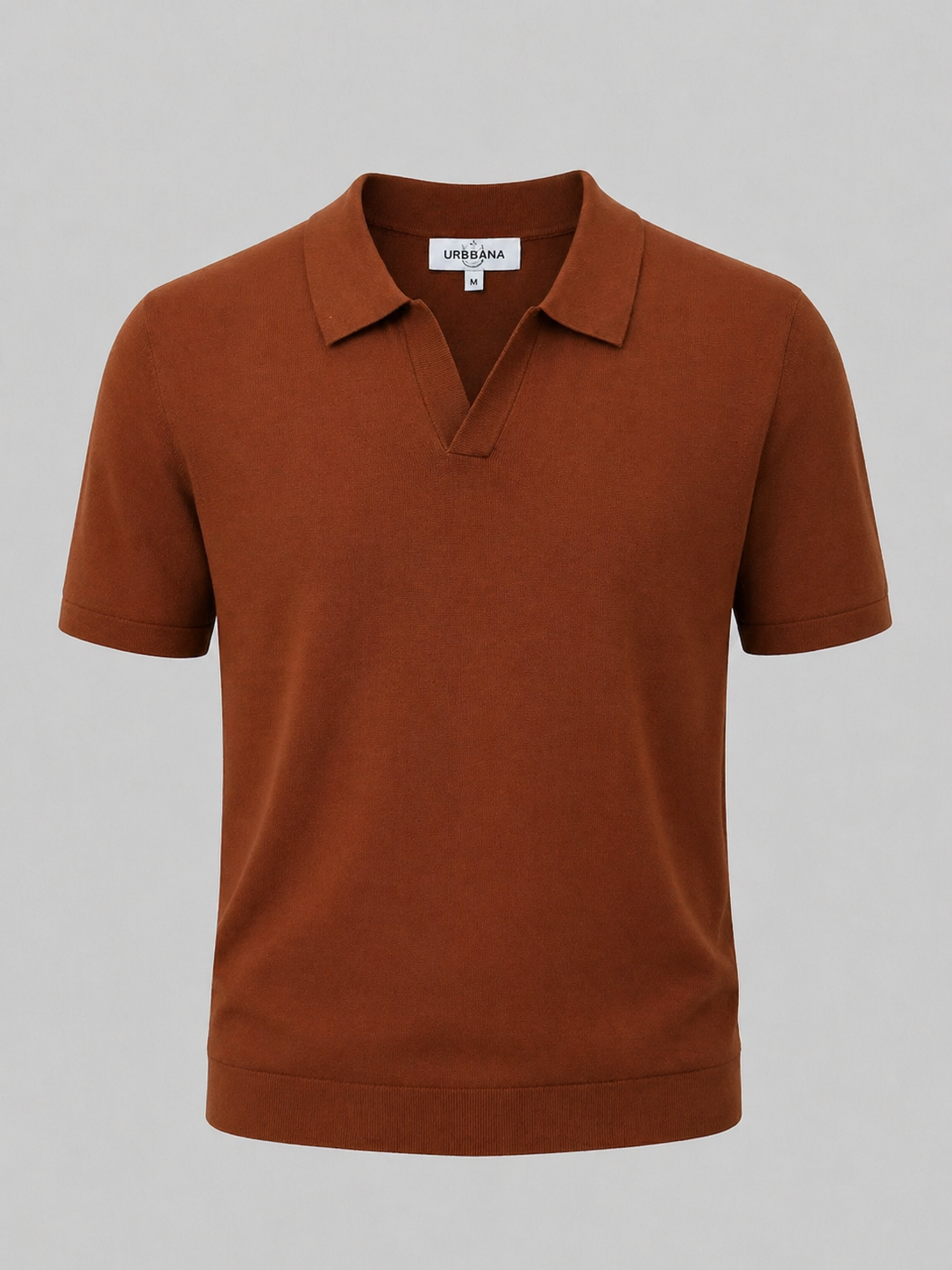 Rust orange short-sleeve knitted polo shirt, shown from the front.