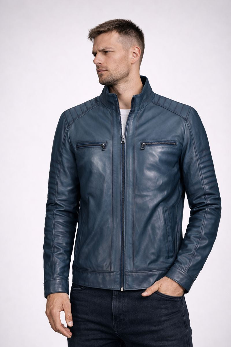 Man wearing a blue leather jacket on a white background