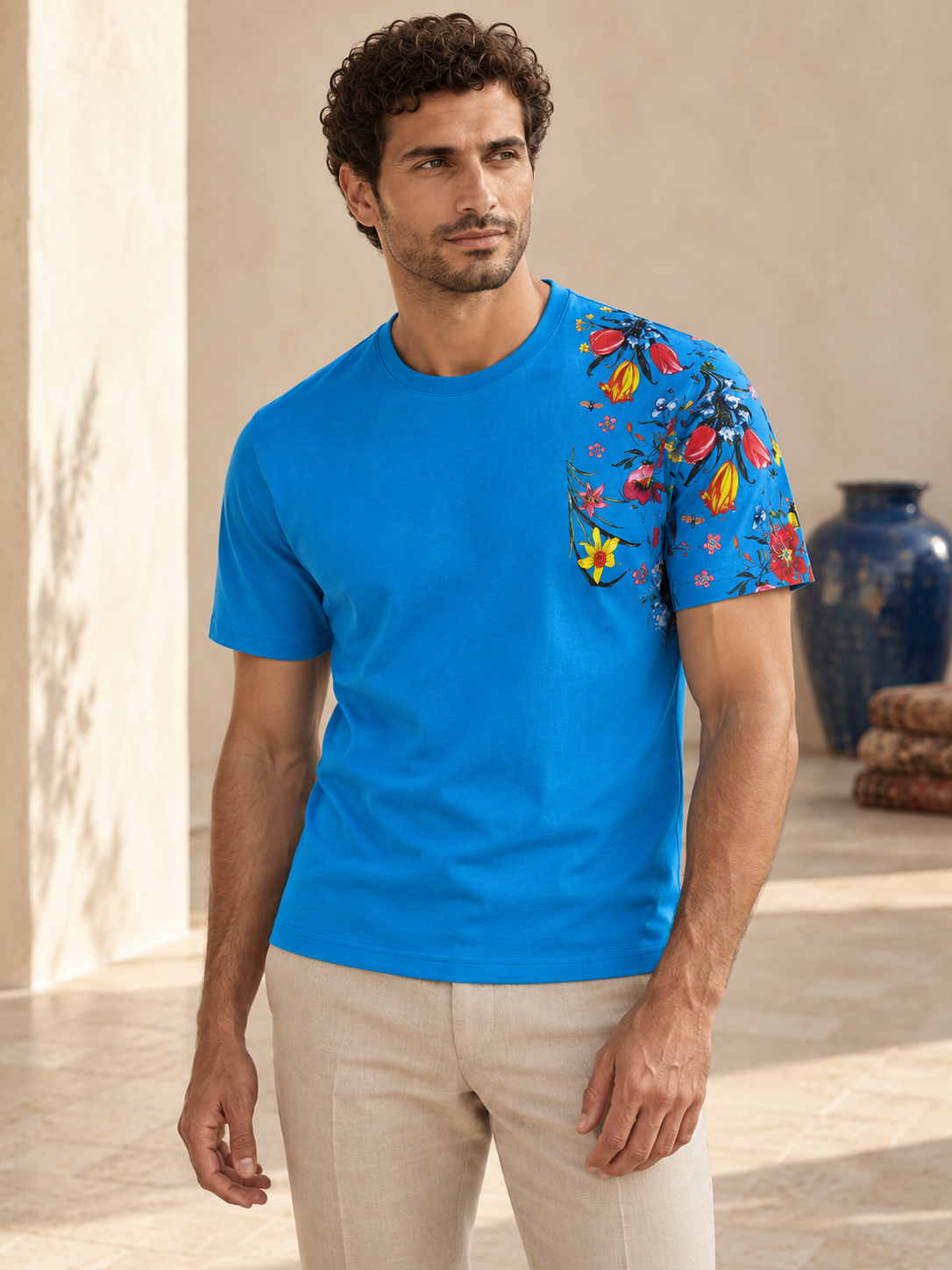 Model wearing Fine Cotton T-shirt with Shoulder Floral Print Blue