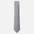 The Cosenza Tie – silver grey and white polka dot silk tie on a light grey background