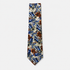 The Matera Tie, an ivory silk tie with navy blue, rust and olive botanical motifs on a light grey background.