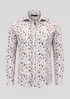 Matisse shirt with a white ditsy floral print in rust and sage, shown from the front.
